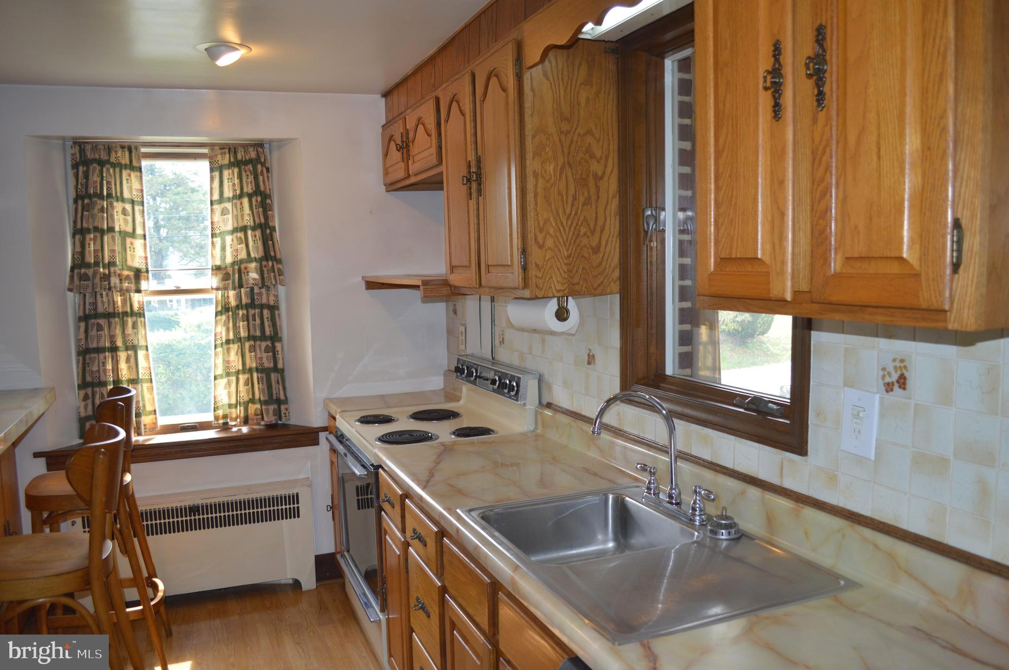 230 Dutton Mill Road Brookhaven, PA 19015 - Photo 12 of 29 Kitchen , bright & sunny
