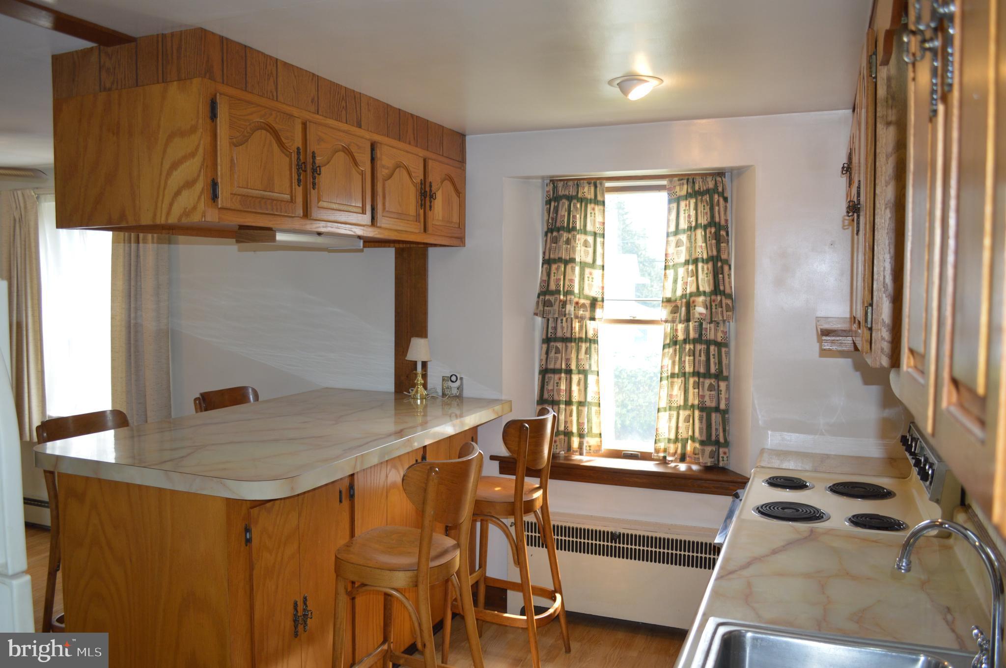 230 Dutton Mill Road Brookhaven, PA 19015 - Photo 3 of 29 breakfast bar w/storage