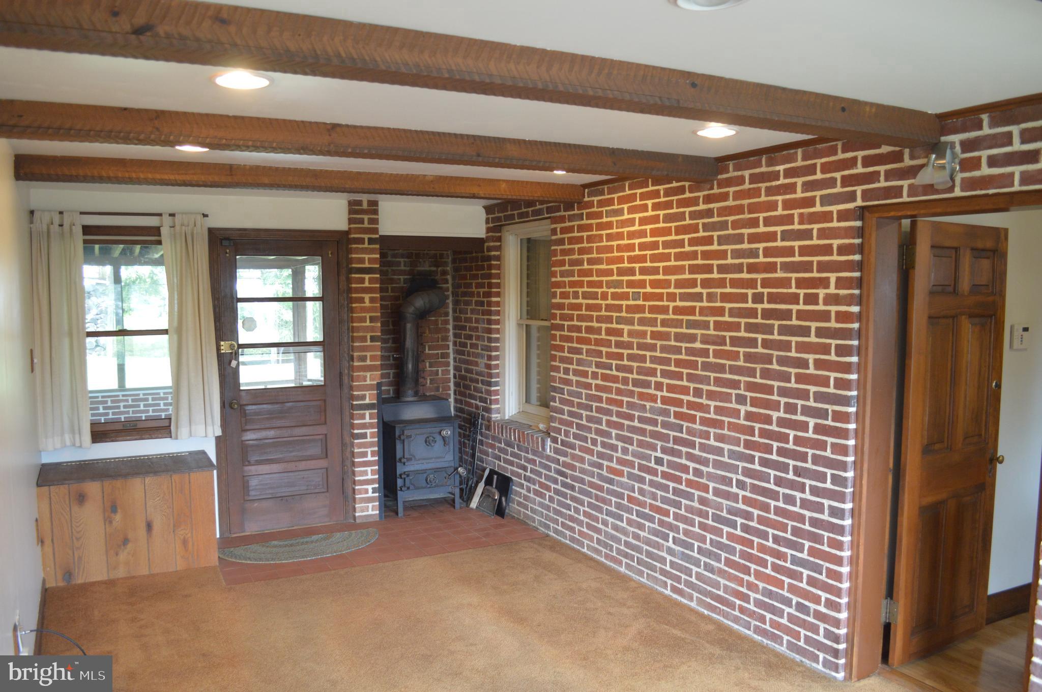 230 Dutton Mill Road Brookhaven, PA 19015 - Photo 8 of 29 Family rm w/overhead lighting & exposed beams
