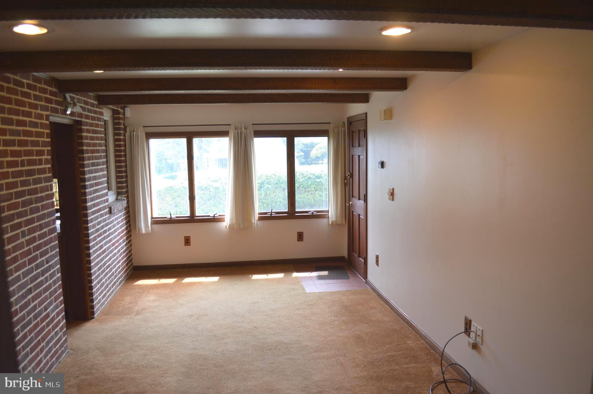 230 Dutton Mill Road Brookhaven, PA 19015 - Photo 9 of 29 Family rm looking to the front of the home