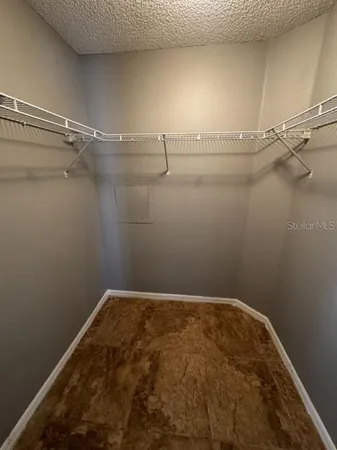 a view of a room with racks on the wall
