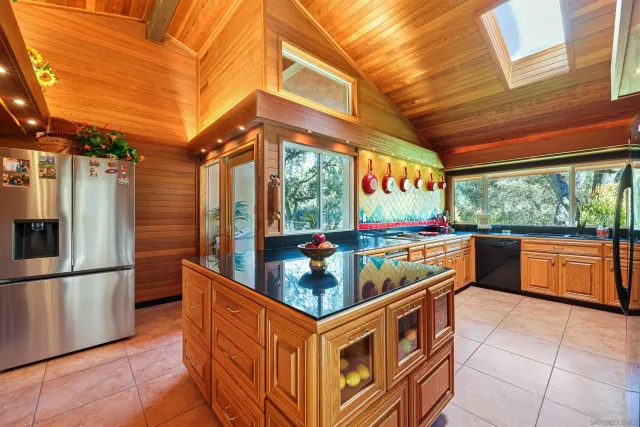 a view of a chairs and table in the balcony