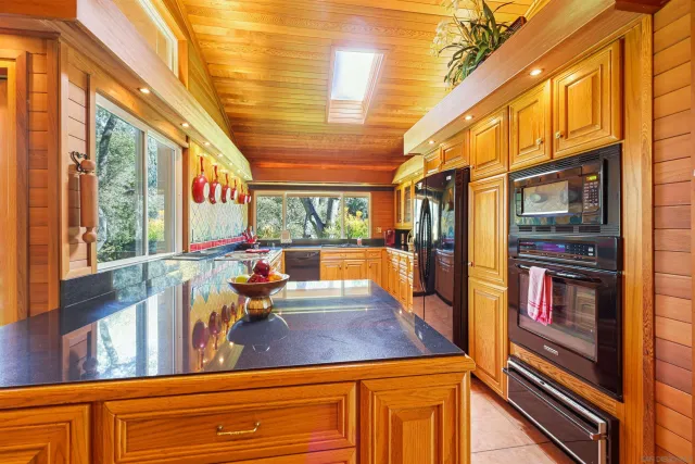 a view of a living room and bathroom