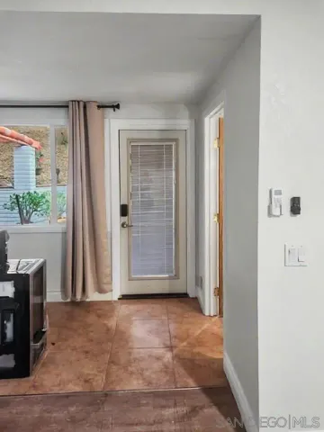 a view of livingroom with furniture and window