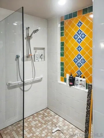 a front view of a house with a yard and street view