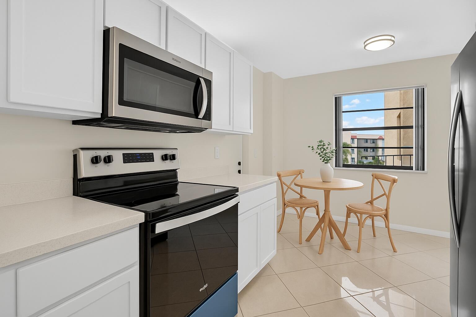 23344 Carolwood Lane, Unit 306 Boca Raton, FL 33428 - Photo 2 of 25 Cozy Dining Nook with Kitchen View (1)