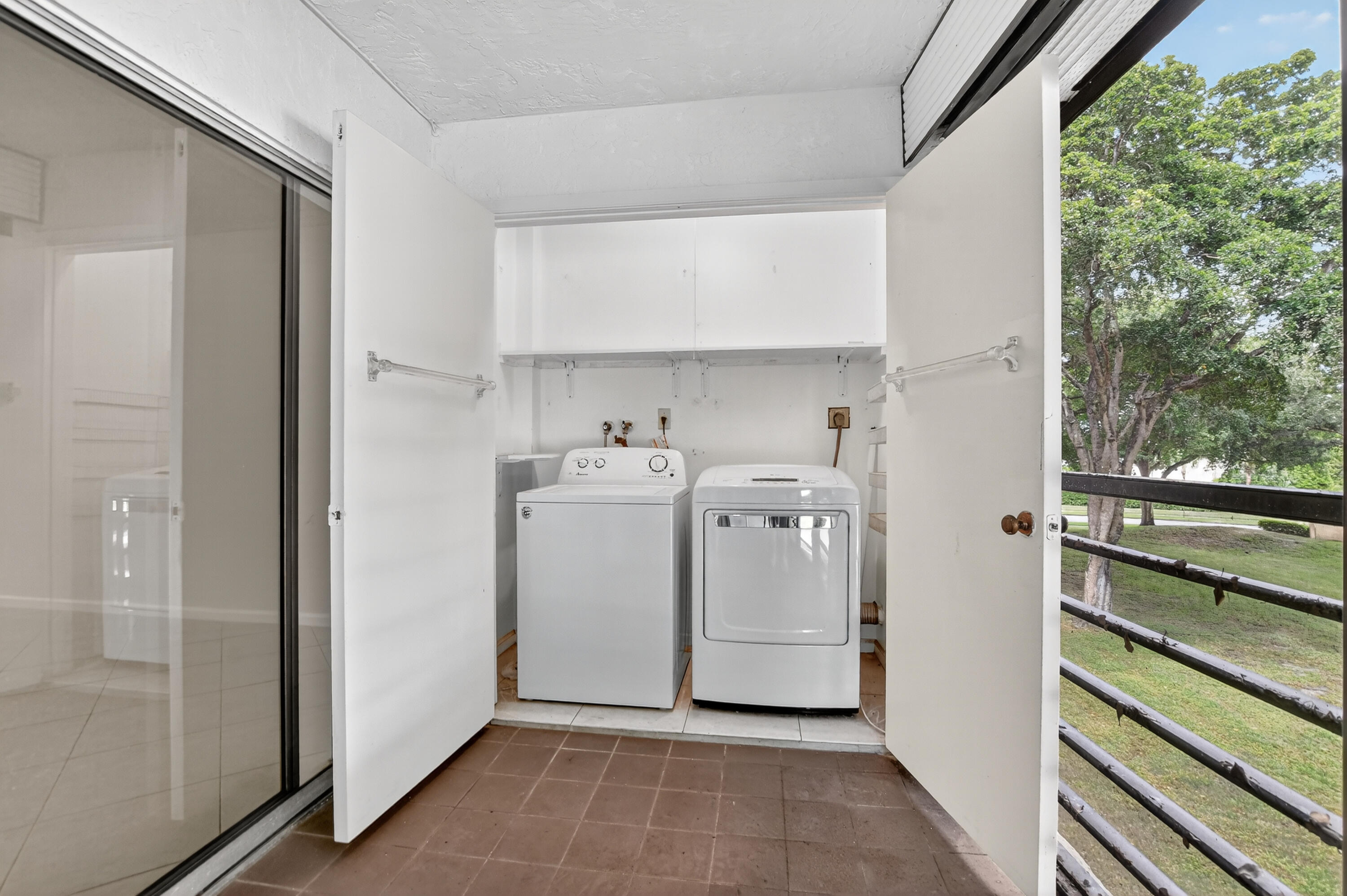 23344 Carolwood Lane, Unit 306 Boca Raton, FL 33428 - Photo 6 of 25 washer dryer