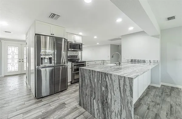 $499,900 | 1125 Fernwood Drive, Holiday, FL 34690