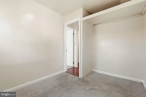 an empty room with closet