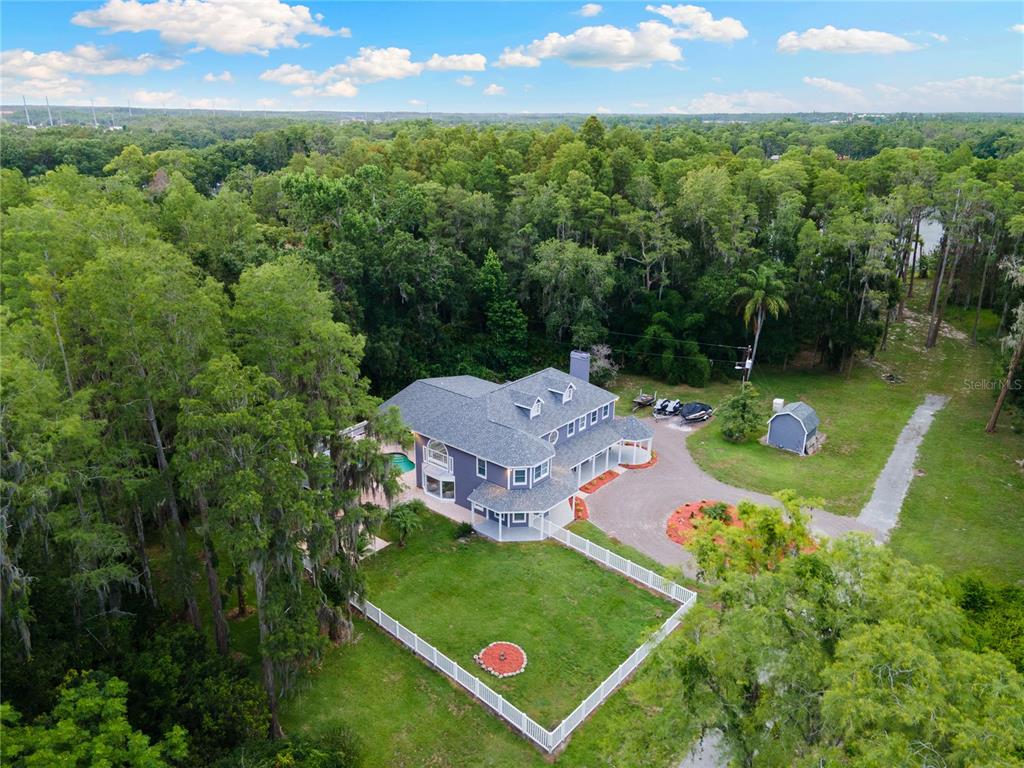 3663 Berger Road Lutz, FL 33548 - Photo 1 of 65 an aerial view of a house