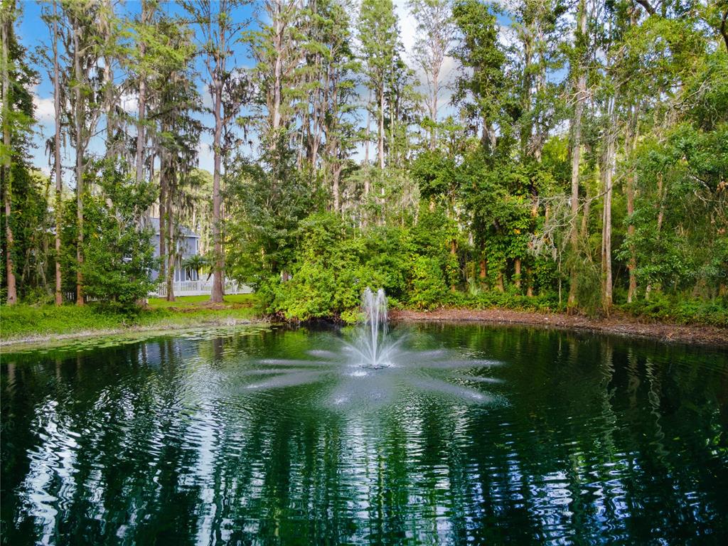 3663 Berger Road Lutz, FL 33548 - Photo 15 of 65 a view of a lake view with a bench