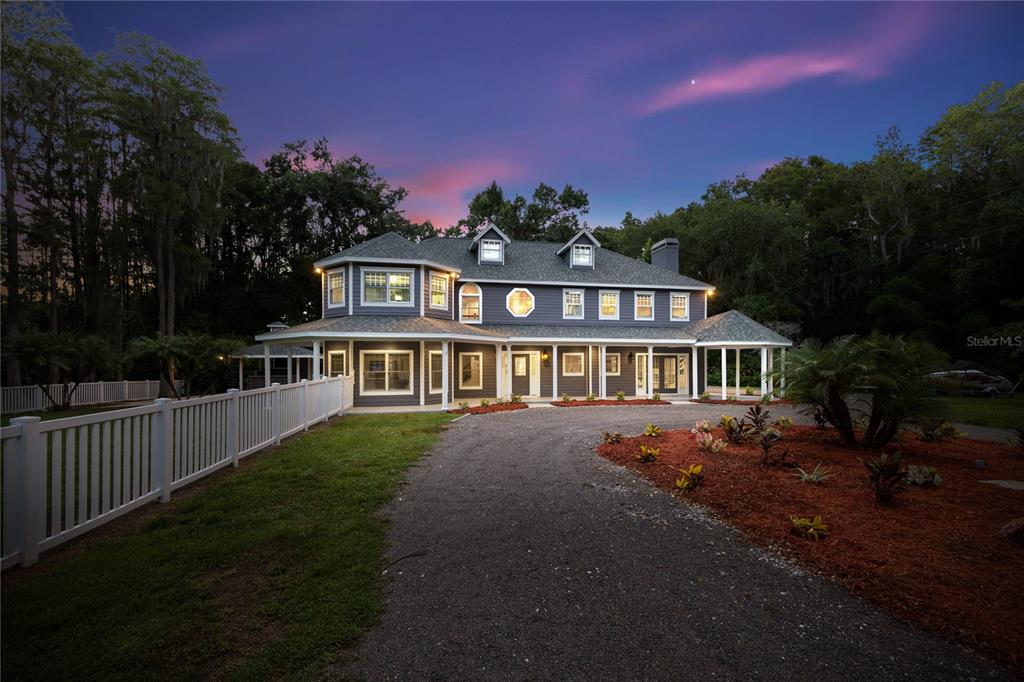 3663 Berger Road Lutz, FL 33548 - Photo 2 of 65 a view of a house with a yard