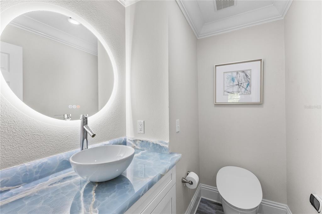 3663 Berger Road Lutz, FL 33548 - Photo 22 of 65 a bathroom with a toilet and a sink