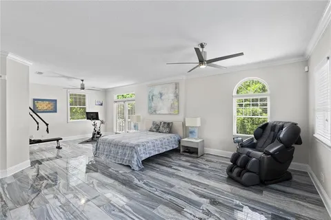 a spacious bathroom with a granite countertop sink and a mirror