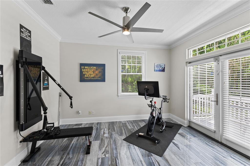 3663 Berger Road Lutz, FL 33548 - Photo 32 of 65 a view of a livingroom with wooden floor and a window