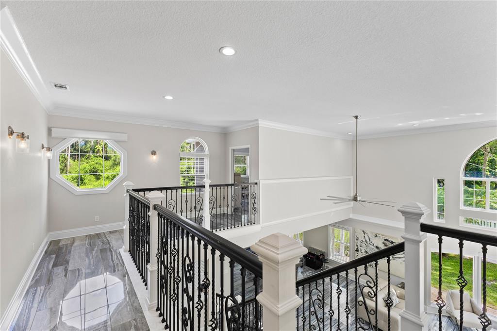 3663 Berger Road Lutz, FL 33548 - Photo 39 of 65 a view of dinning table and chairs in a room