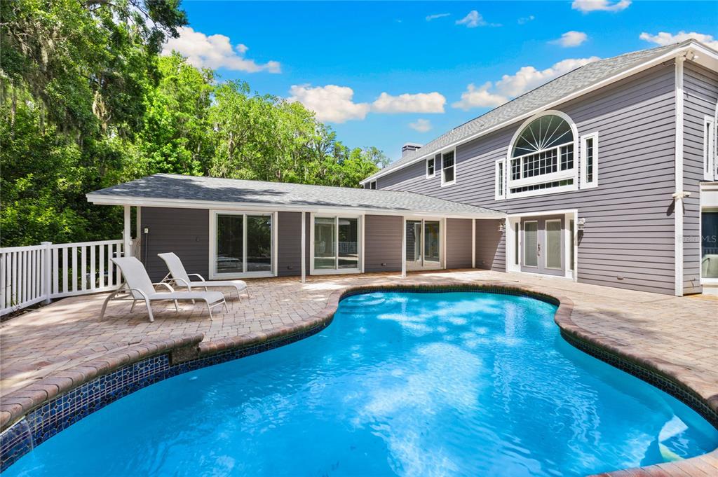 3663 Berger Road Lutz, FL 33548 - Photo 44 of 65 a view of a house with swimming pool porch and wooden floor