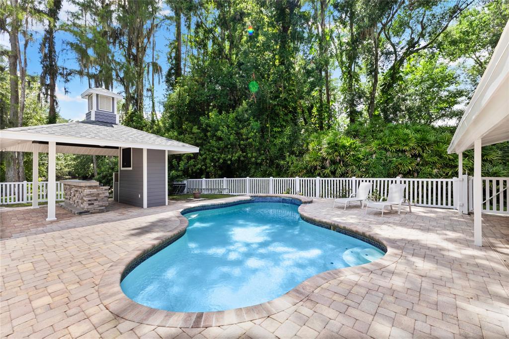 3663 Berger Road Lutz, FL 33548 - Photo 45 of 65 a view of a house with swimming pool