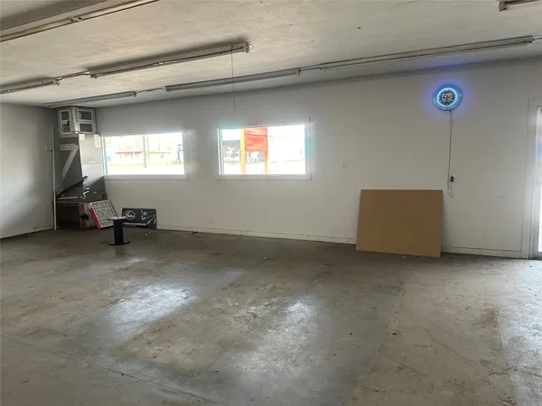 a view of room with window and air conditioner duct