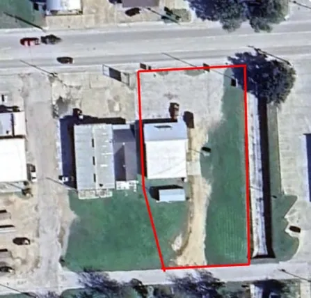 an aerial view of houses with outdoor space