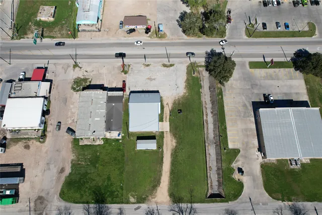 an aerial view of a house with a garden