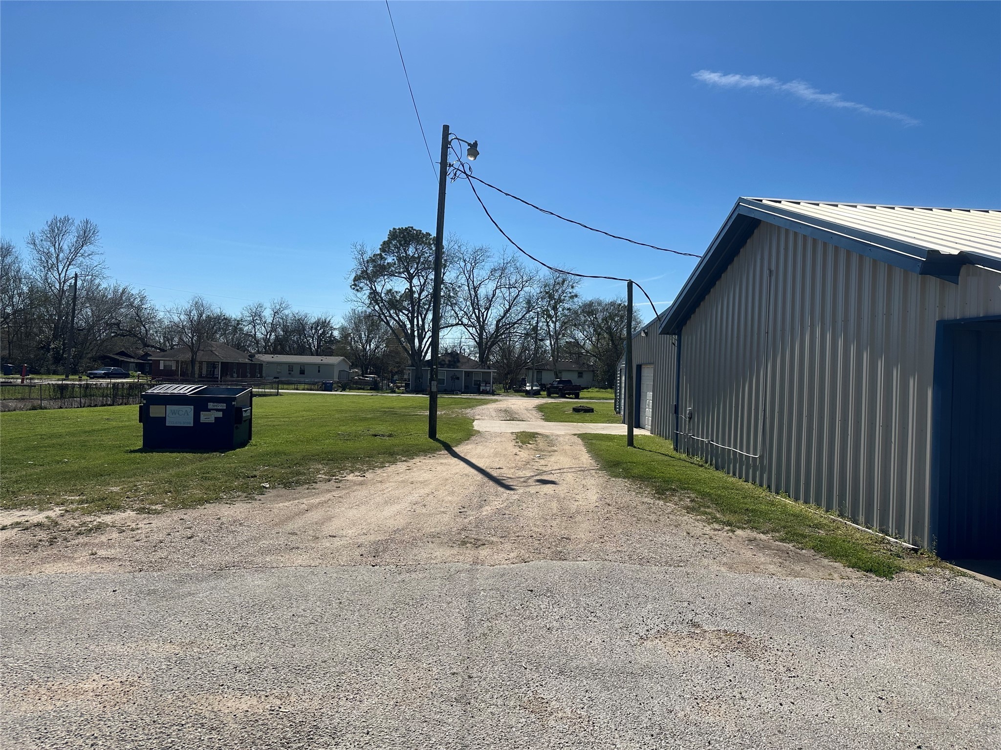 607 East Main Street Eagle Lake, TX 77434 - Photo 4 of 21 a view of a backyard with swimming pool