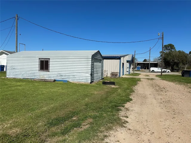 a house view with a backyard space
