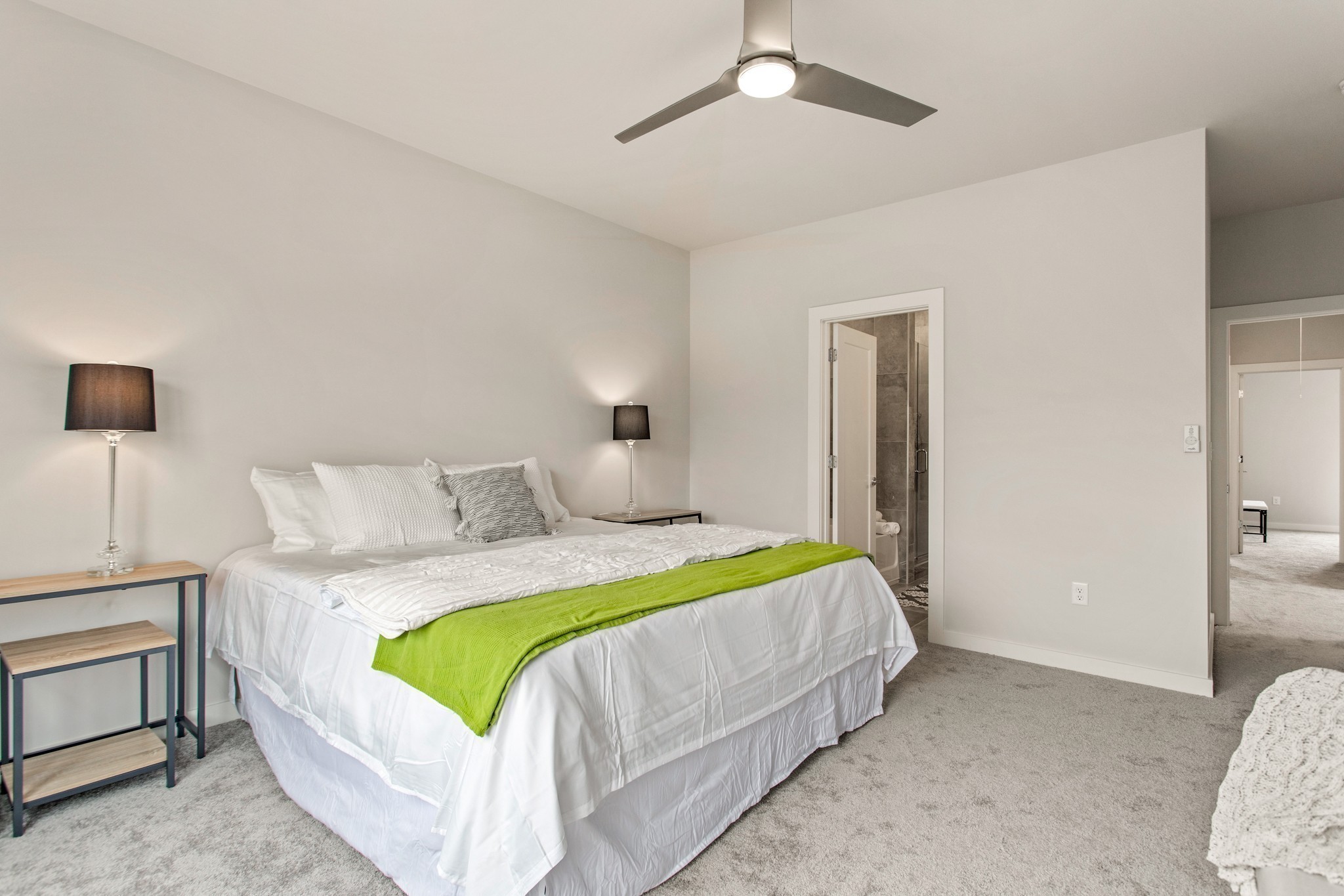 3625 Hydes Ferry Road Nashville, TN 37218 - Photo 12 of 17 a bedroom with a bed and a chandelier