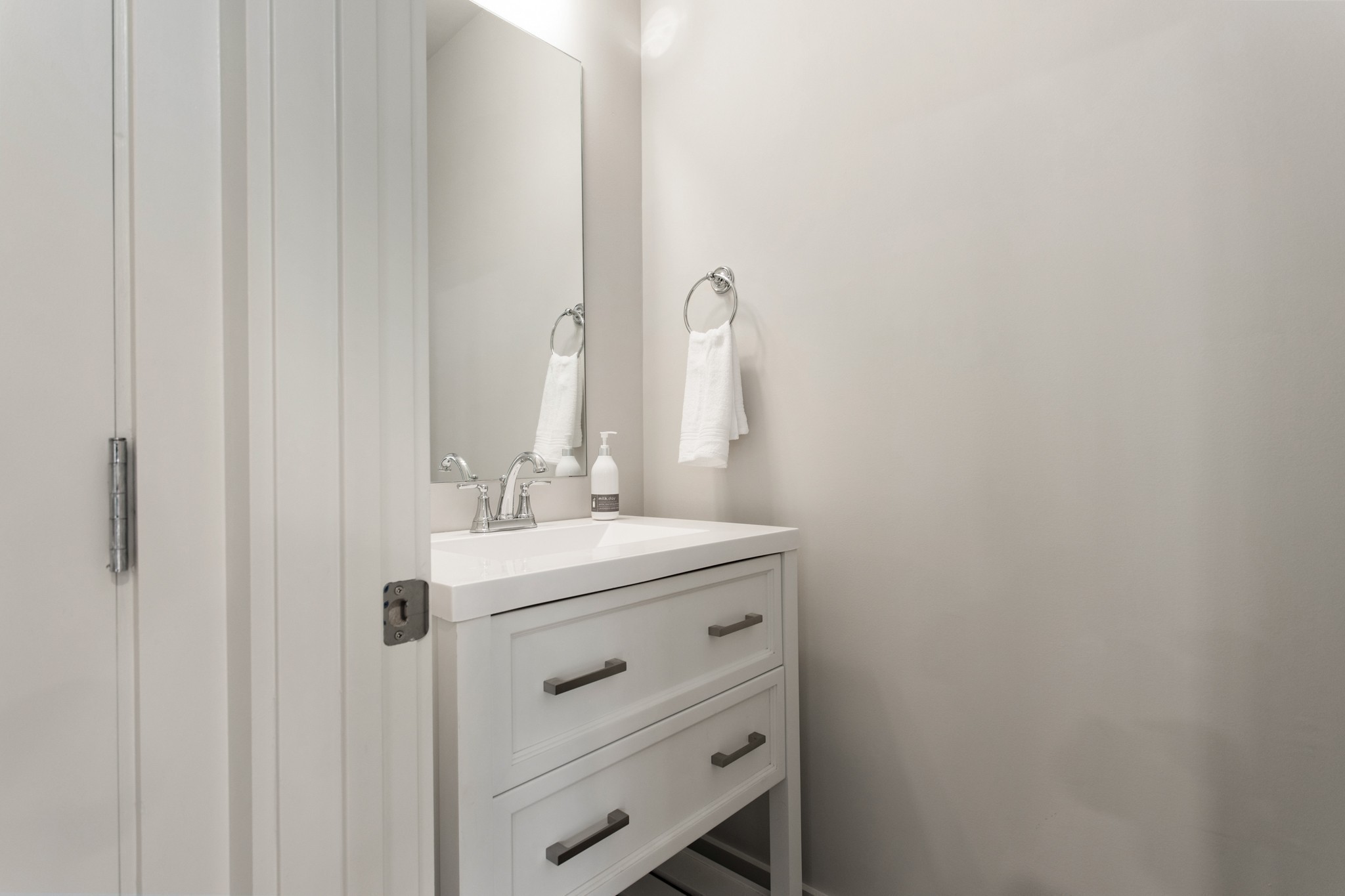 3625 Hydes Ferry Road Nashville, TN 37218 - Photo 10 of 17 a bathroom with a sink and a mirror