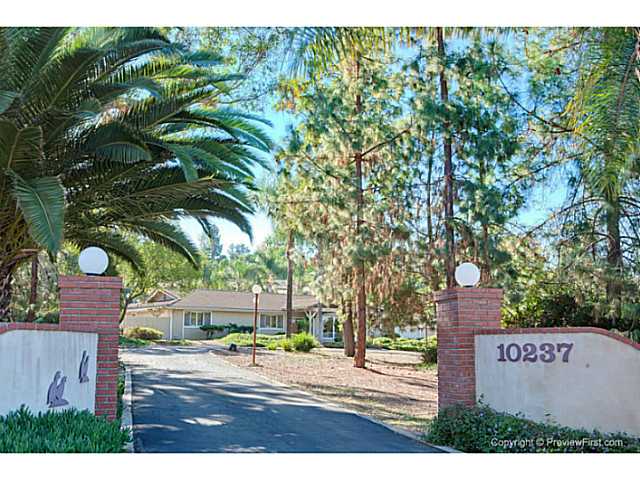 10237 Quail Canyon Road El Cajon, CA 92021 - Photo 23 of 24 Two-sided entry to a long circular driveway