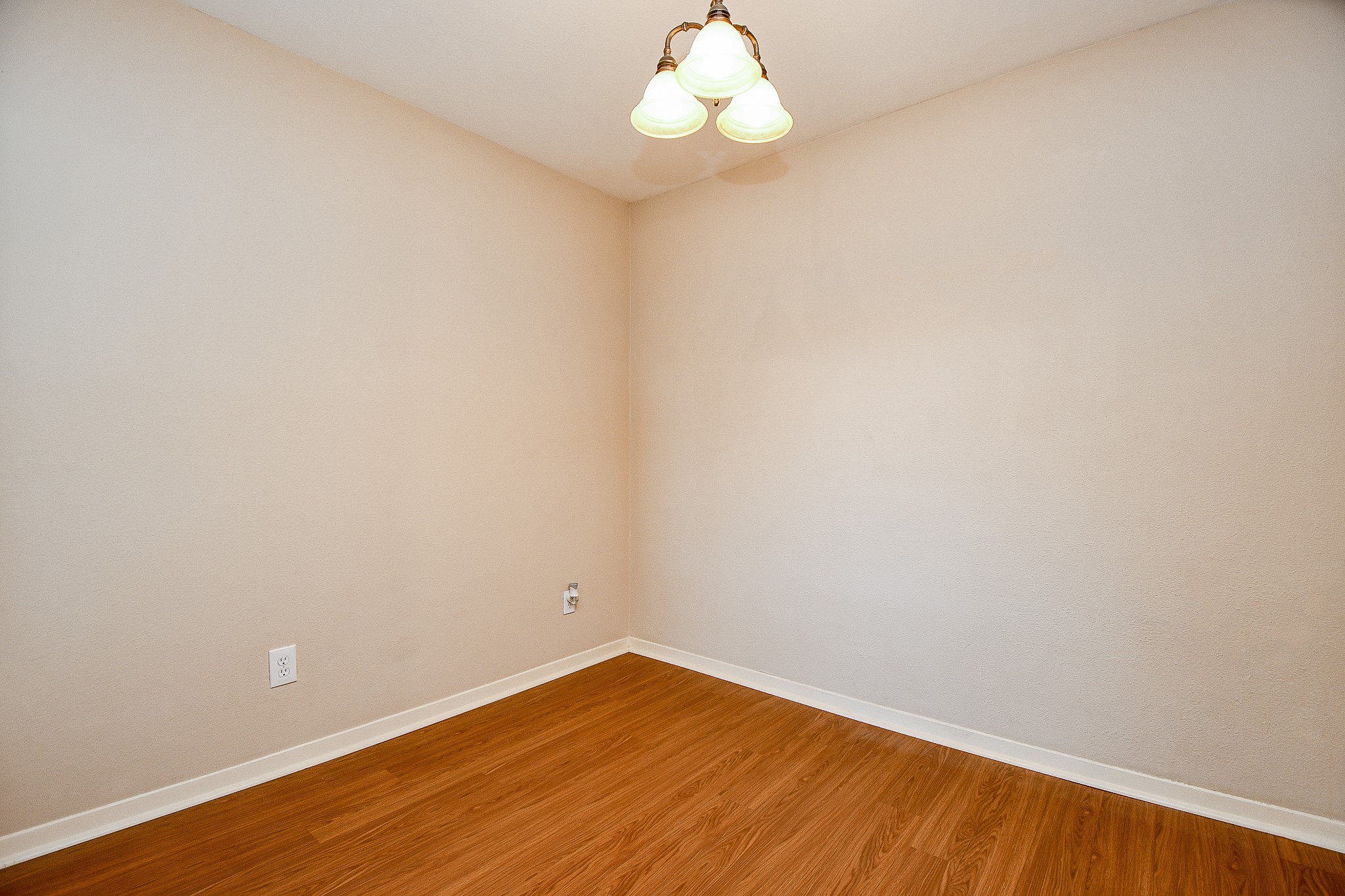 3500 Tangle Brush Drive, Unit 14 Spring, TX 77381 - Photo 11 of 33 a view of an empty room with wooden floor