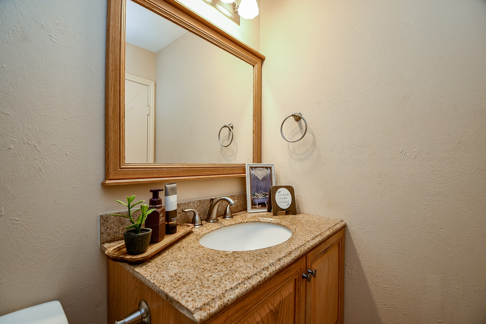 3500 Tangle Brush Drive, Unit 14 Spring, TX 77381 - Photo 27 of 33 a bathroom with a granite countertop sink and a mirror