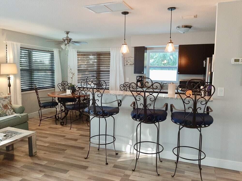 511 Northwest 3rd Street Delray Beach, FL 33444 - Photo 11 of 21 a view of a dining room with furniture window and outside view