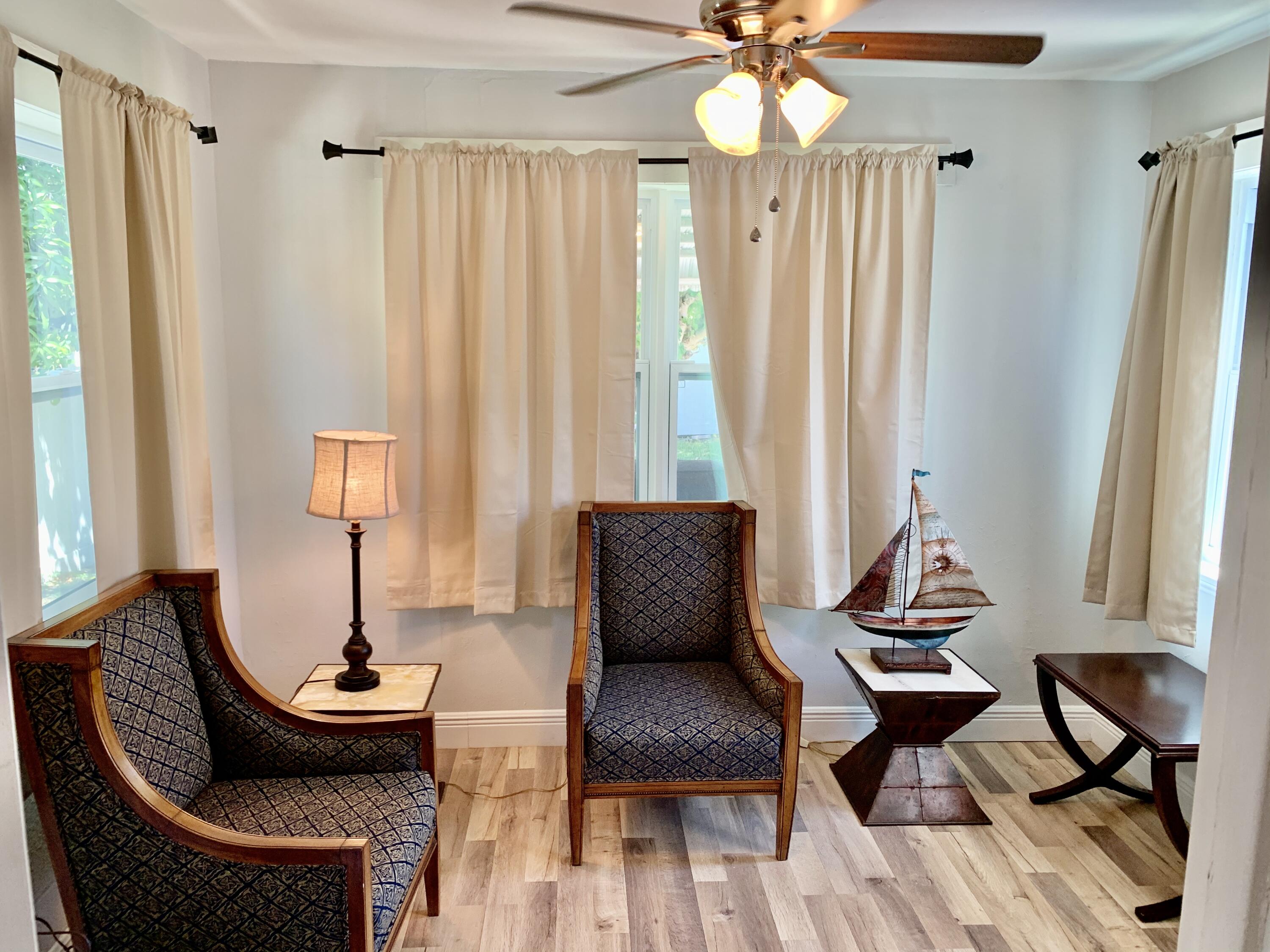 511 Northwest 3rd Street Delray Beach, FL 33444 - Photo 13 of 21 a living room with furniture and a window