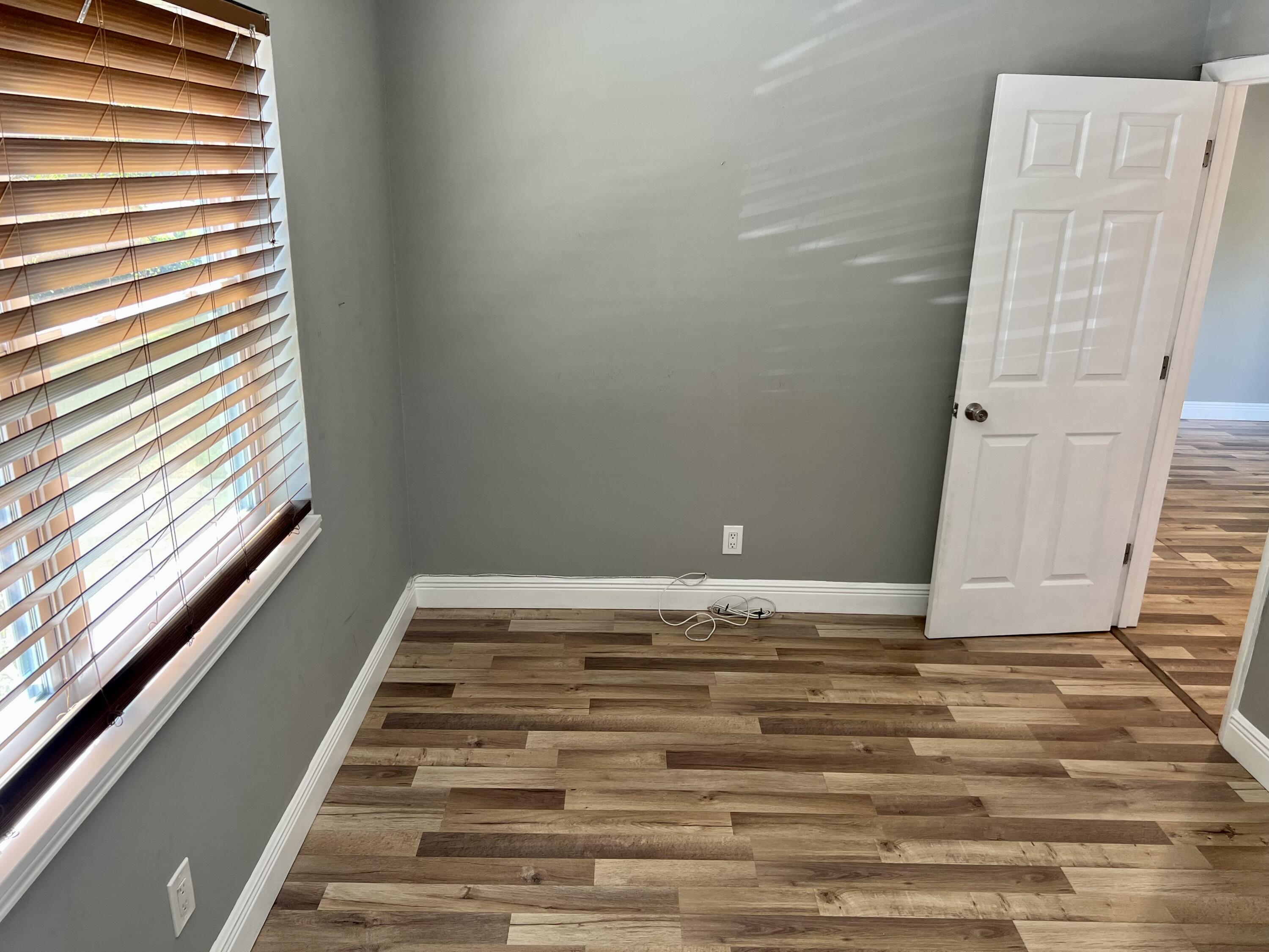 511 Northwest 3rd Street Delray Beach, FL 33444 - Photo 15 of 21 a view of wooden floor