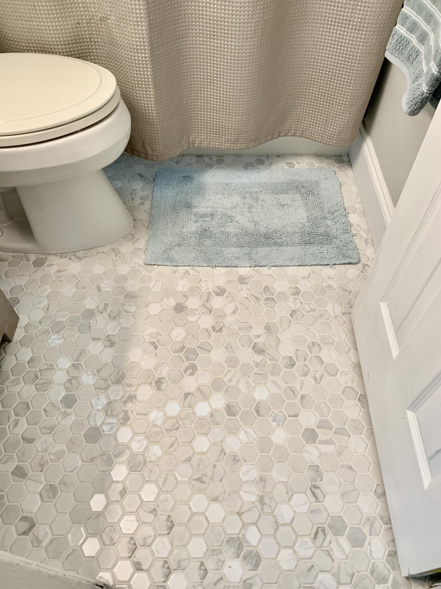 511 Northwest 3rd Street Delray Beach, FL 33444 - Photo 19 of 21 a white toilet sitting next to a sink