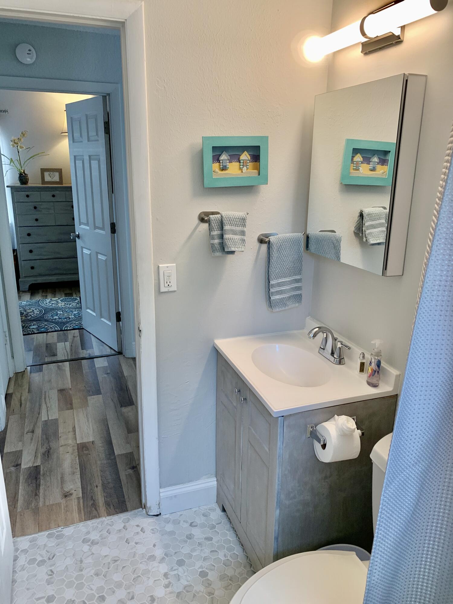 511 Northwest 3rd Street Delray Beach, FL 33444 - Photo 20 of 21 a bathroom with a sink toilet and shower