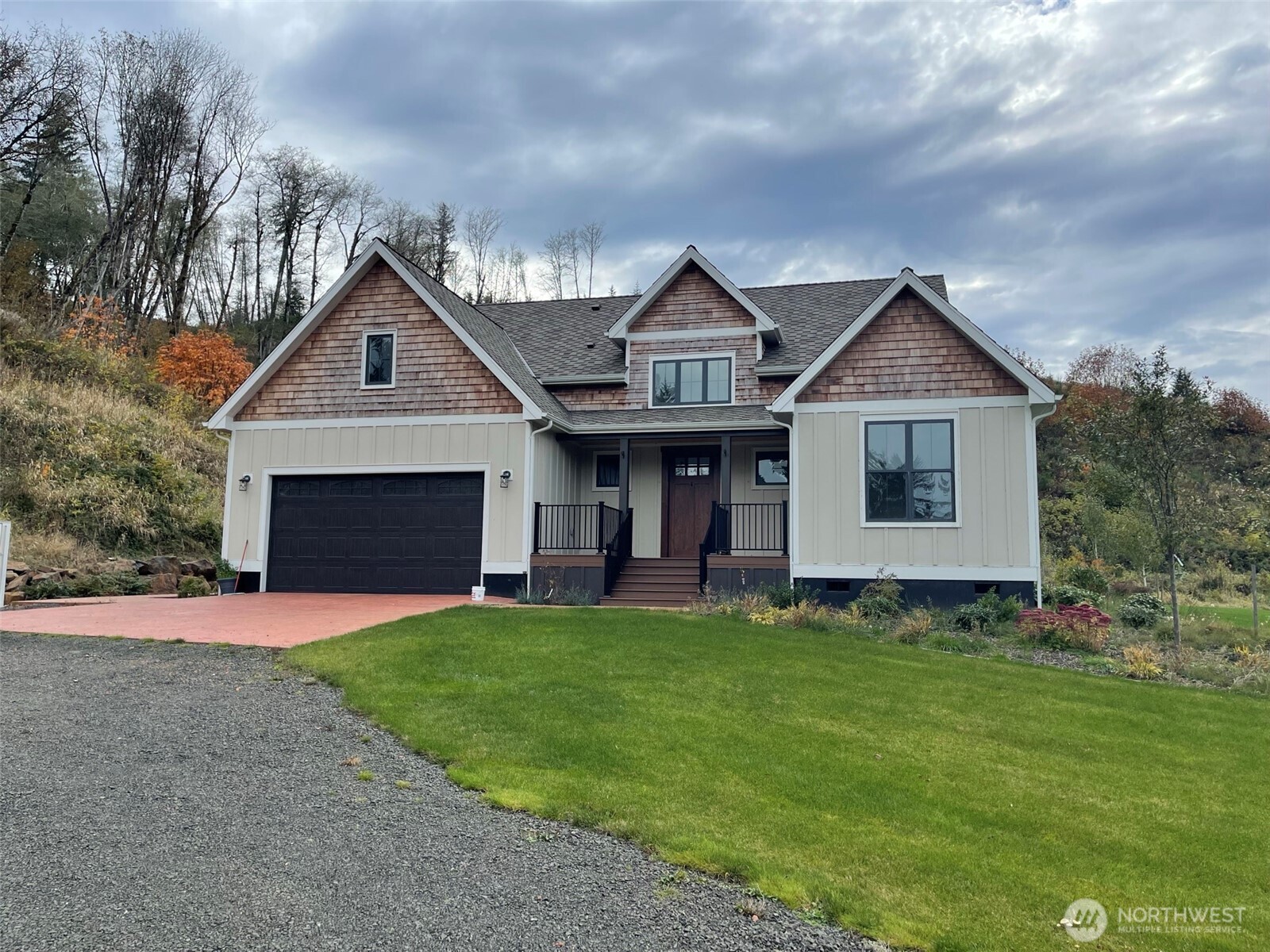 1851 Bloomhardt Road Raymond, WA 98577 - Photo 1 of 31 a front view of a house with a garden and yard