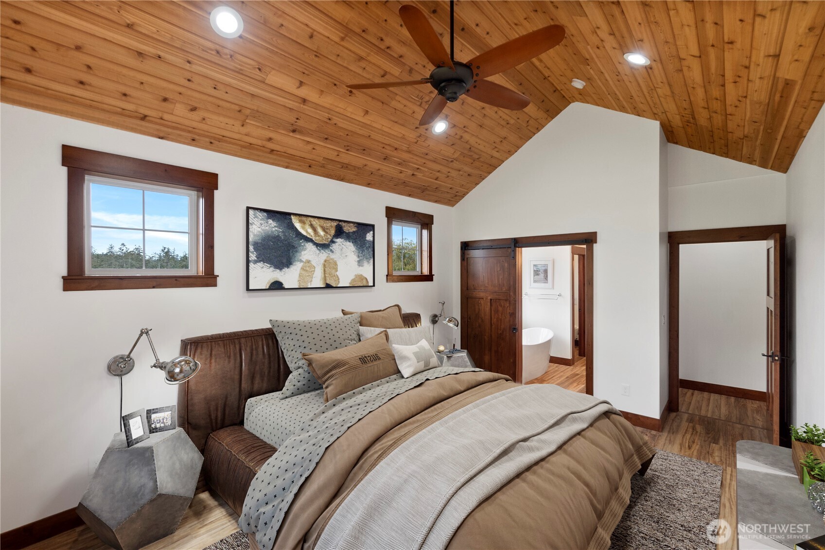 1851 Bloomhardt Road Raymond, WA 98577 - Photo 11 of 31 a bedroom with furniture and a large window