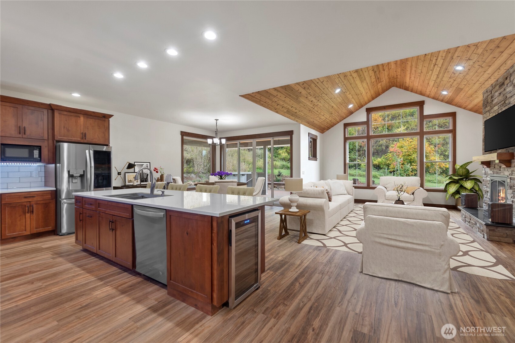1851 Bloomhardt Road Raymond, WA 98577 - Photo 18 of 31 a large kitchen with stainless steel appliances kitchen island granite countertop a large window a oven and white cabinets