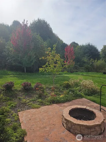 a view of a fire pit with a swimming pool