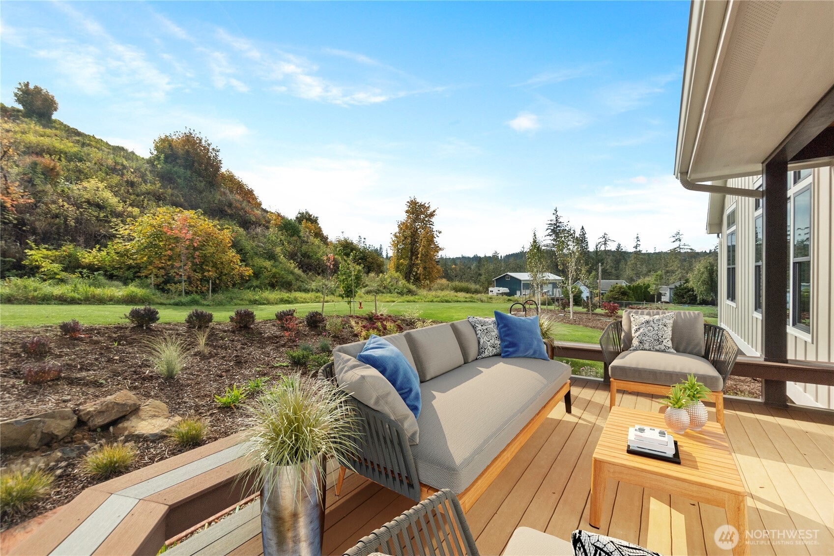 1851 Bloomhardt Road Raymond, WA 98577 - Photo 26 of 31 a view of a terrace with couches and pool