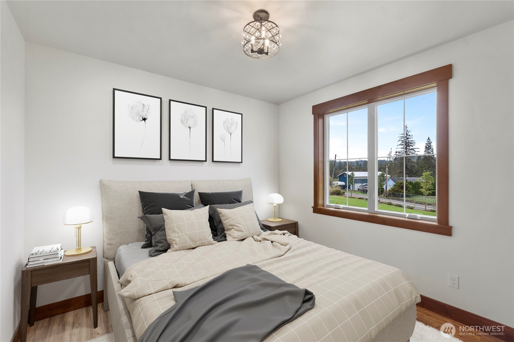 1851 Bloomhardt Road Raymond, WA 98577 - Photo 7 of 31 a bedroom with a bed and a window