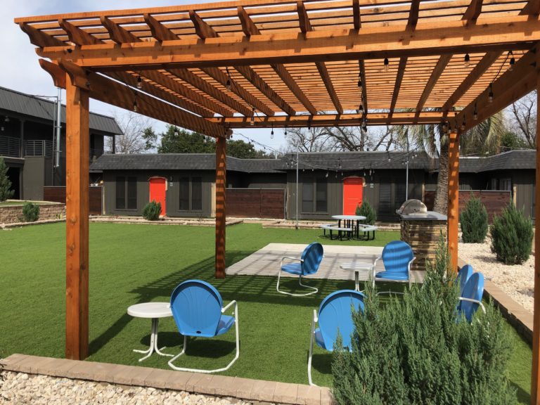 6509 Berkman Drive, Unit 115 Austin, TX 78723 - Photo 16 of 16 a patio with yard table and chairs