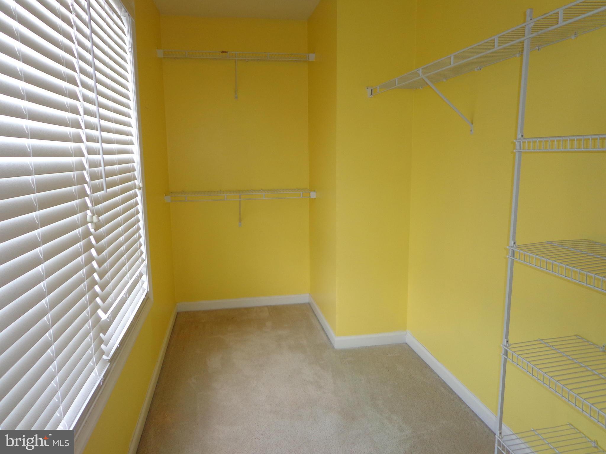 915 Oakdene Road Baltimore, MD 21220 - Photo 20 of 30 a view of a room with wooden floor and a window