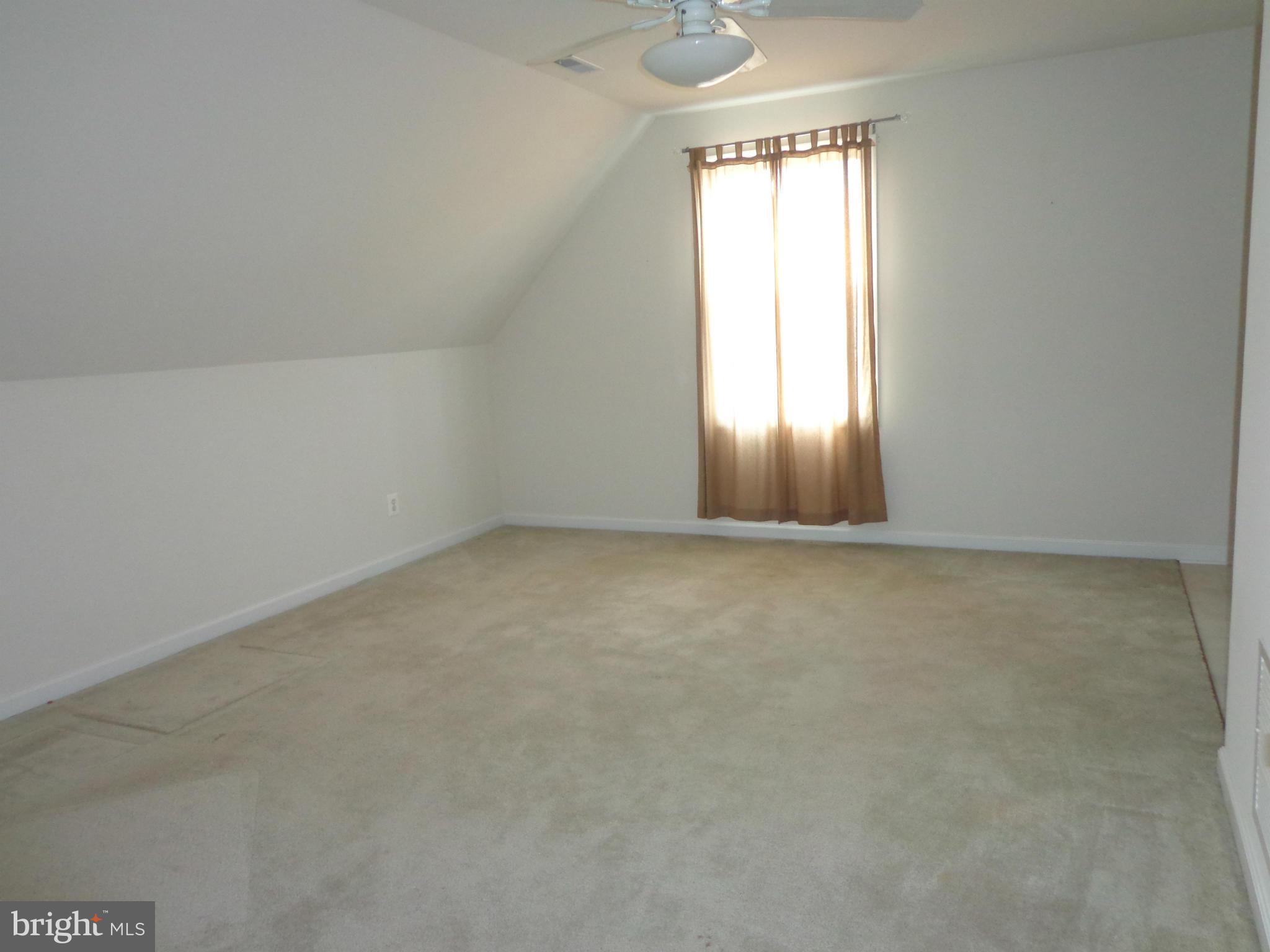 915 Oakdene Road Baltimore, MD 21220 - Photo 22 of 30 an empty room with a window