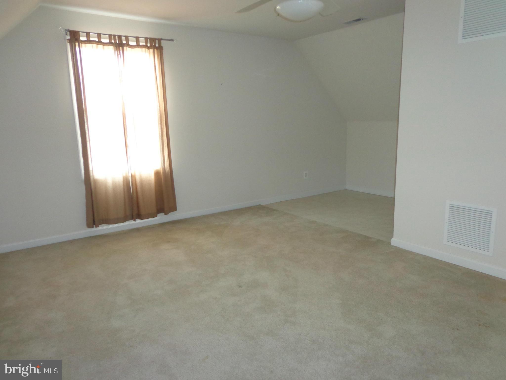 915 Oakdene Road Baltimore, MD 21220 - Photo 23 of 30 an empty room with a window
