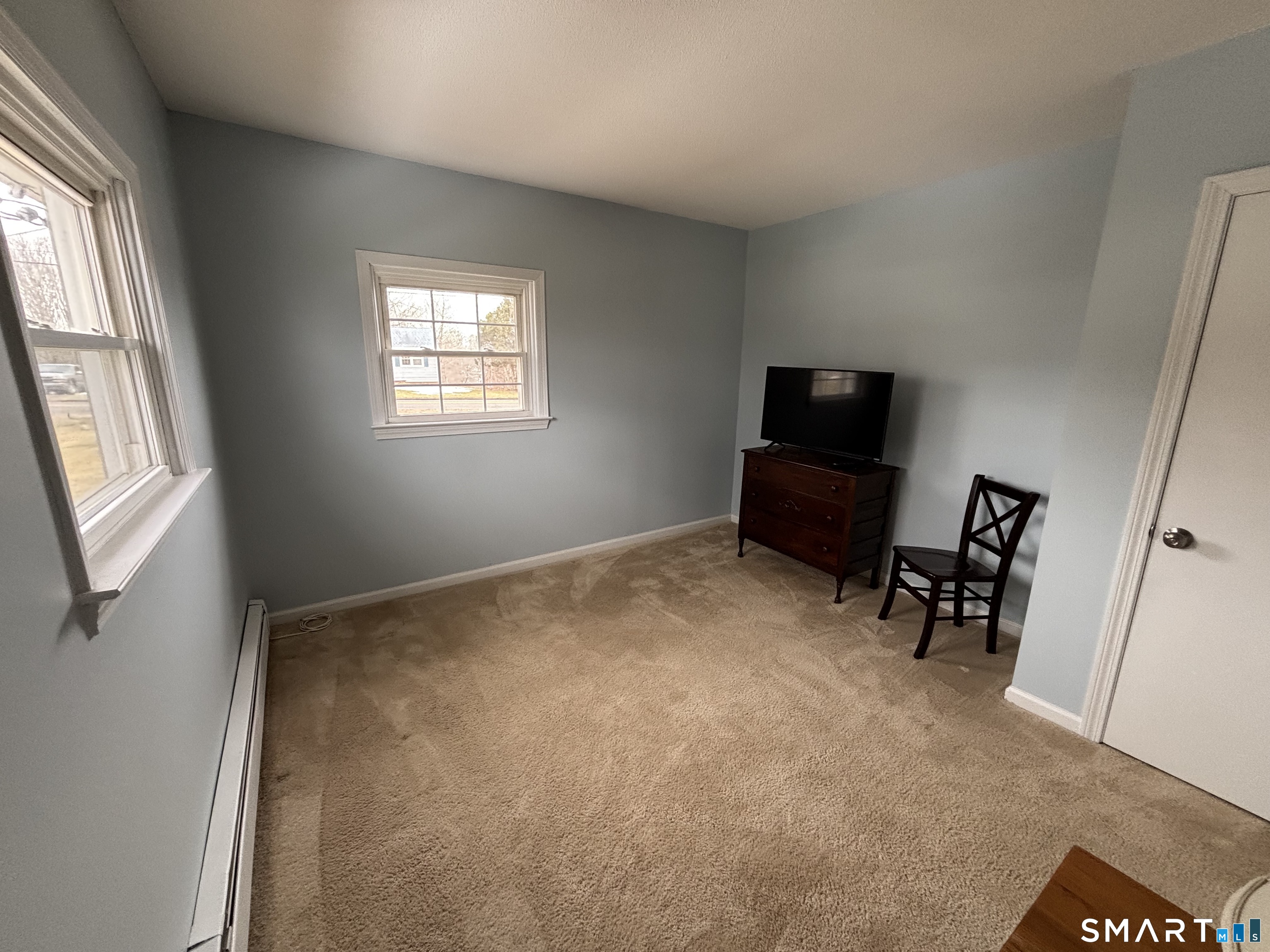 324 Savage Hill Road Berlin, CT 06037 - Photo 12 of 27 a view of livingroom with furniture and windows