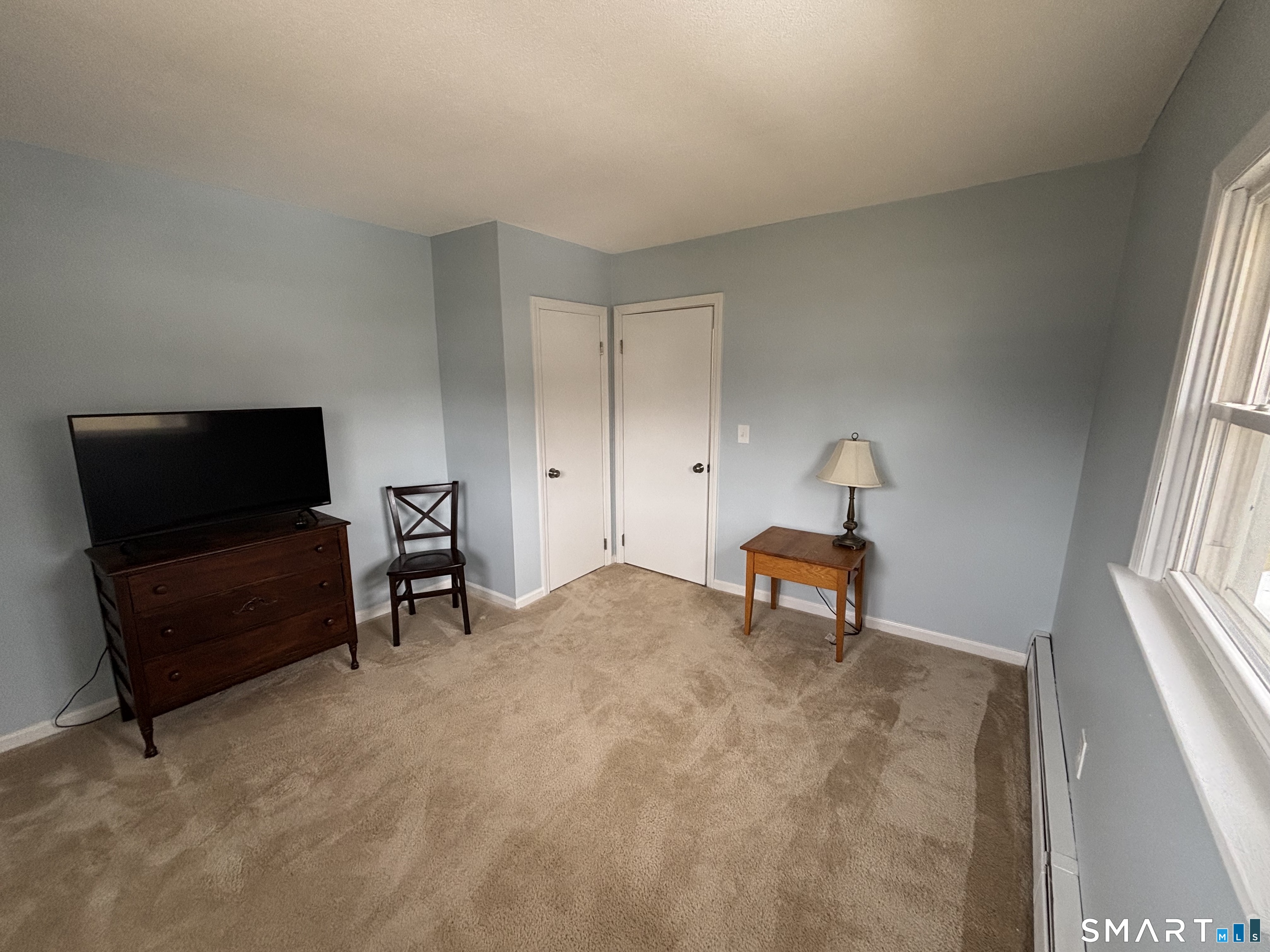 324 Savage Hill Road Berlin, CT 06037 - Photo 13 of 27 a bedroom with furniture and a window