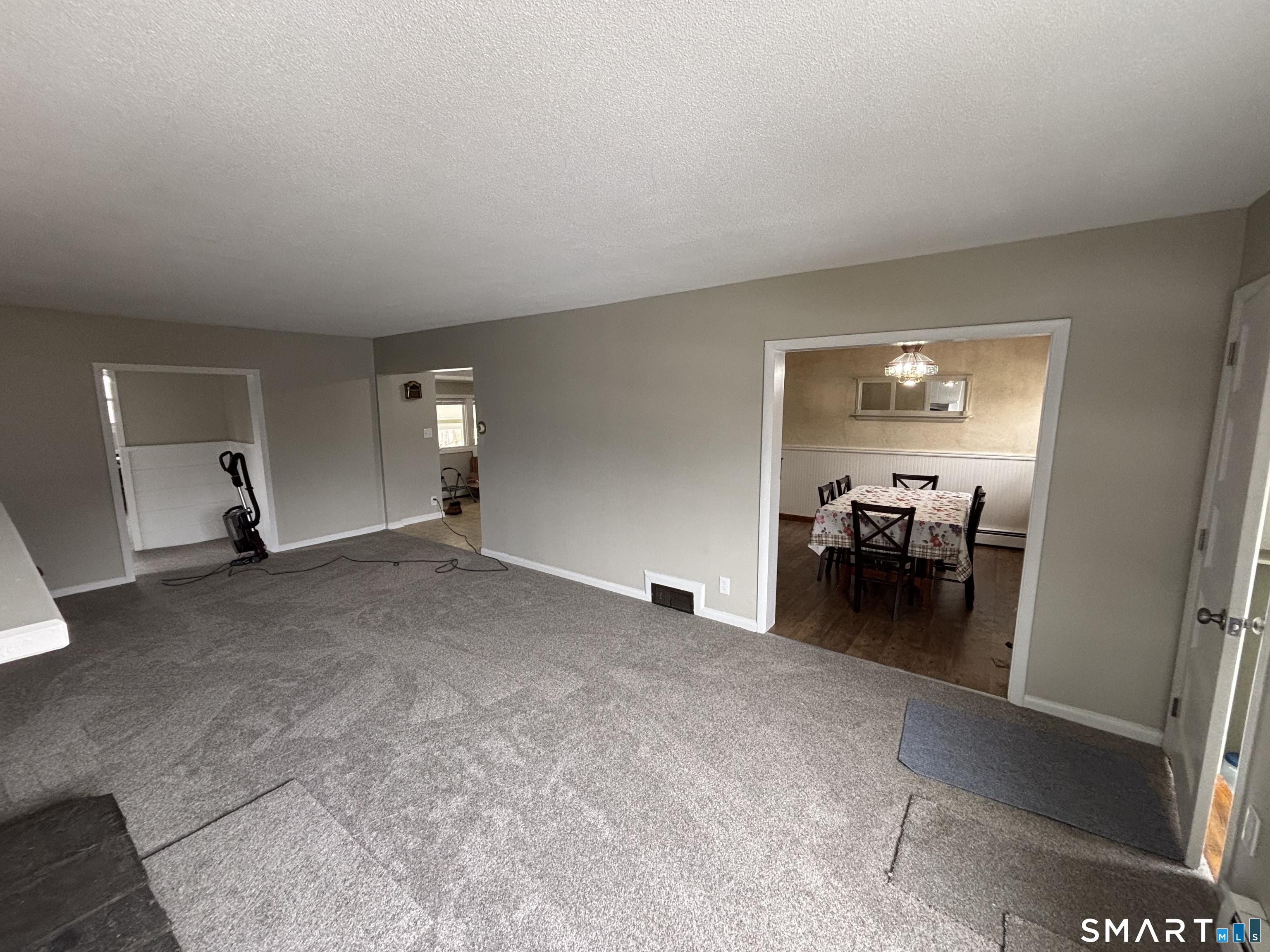 324 Savage Hill Road Berlin, CT 06037 - Photo 18 of 27 a view of a livingroom and a dining room and a livingroom with furniture